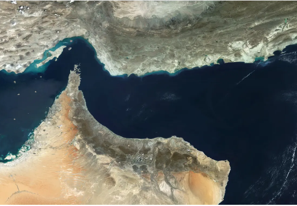 Satellite view of the Strait of Hormuz, a critical chokepoint for global energy supply.
