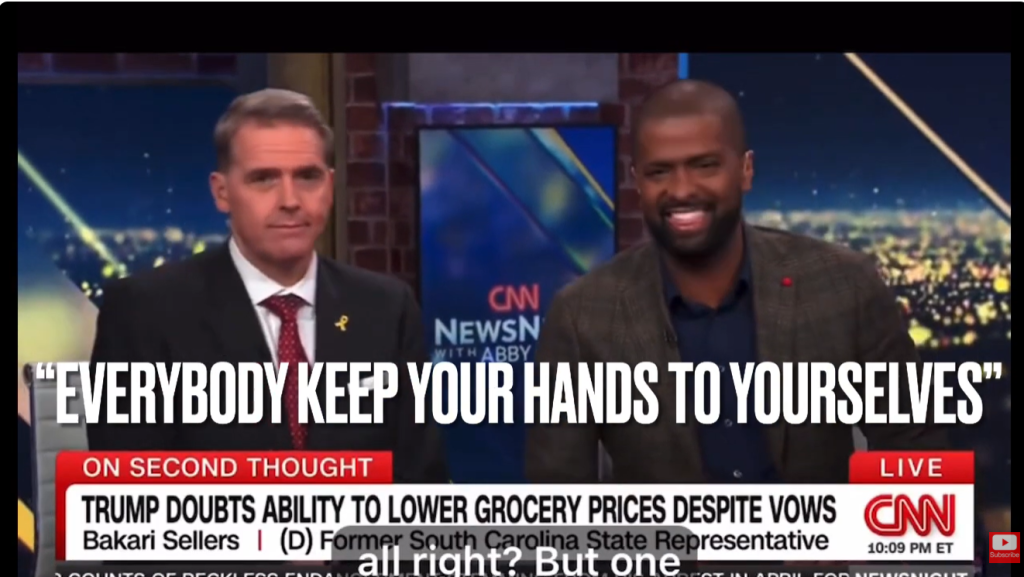 Screenshot of a Cnn News Broadcast with Two Male Anchors on a Studio Set, Bold Quote Text Across the Screen Reading “everybody Keep Your Hands to Yourselves,” and a Red Lower Banner About Trump and Grocery Prices Screenshot of a Cnn News Broadcast with Two Male Anchors on a Studio Set, Bold Quote Text Across the Screen Reading “everybody Keep Your Hands to Yourselves,” and a Red Lower Banner About Trump and Grocery Prices